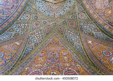 SHIRAZ, IRAN - OCT 21: Persian patterns on tiled wall of mosque Nasir ol Molk with traditional artworks on October 21, 2014. Qajar era Pink Mosque was built in 1888