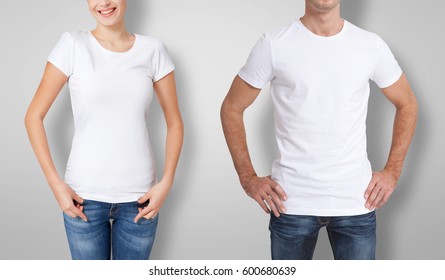 Shirt Design And People Concept - Close Up Of Young Man And Woman In Blank White T-shirt Front And Rear Isolated.