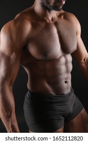 
Shirtless Black Man Body With Black Shorts