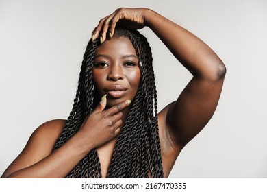 Shirtless Black Woman With Afro Pigtails Smiling And Looking At Camera Isolated Over Grey Background