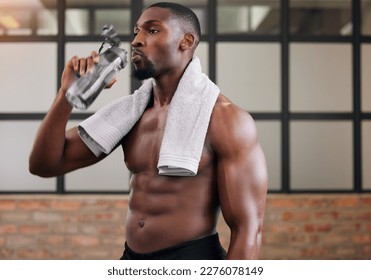 Shirtless bodybuilder, black man and drinking water in gym for health, break and energy of workout, training or diet. Thirsty male, abs and bottle for fitness nutrition, hydration and sports wellness - Powered by Shutterstock