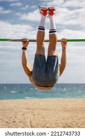 Shirtless Boy Practicing Pole Sport