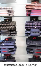 Shirts in a store.