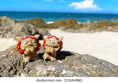 Shisa figurine and background material Okinawa - Shutterstock ID 2176343883