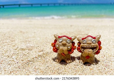 Shisa figurine and background material Okinawa - Shutterstock ID 2176343895