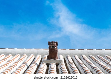 Shisa symbol of Okinawa Lion on original Ryukyu architecture roof art Okinawa island Japan