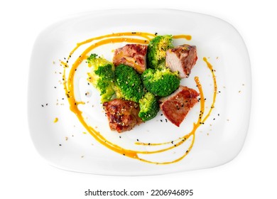 Shish Kebab, Pieces Of Meat With Broccoli. Balanced, Nutritious, Tasty And Nutritious Food. Ready-made Menu For A Restaurant Or For Delivery. Dish In A White Plate Isolated On A White Background.