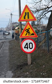 Shivering Signs Informing The Works On The Road And Narrowing The Road On The Left Side. Speed Limit 40 Km. Organization Of Traffic By Road Signs.