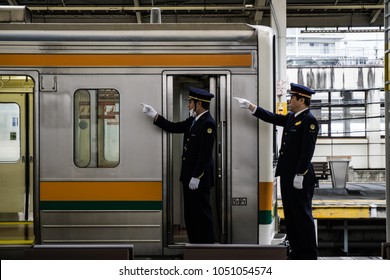 Shizuoka, Japan - March 10th, 2018: Japanese train driver conduct safety checks before departure