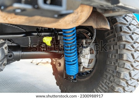 shock Absorber and Coil Spring of Car Suspension System