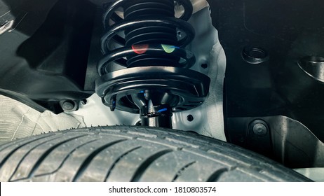 shock absorber strut with coil spring, suspension system of modern car