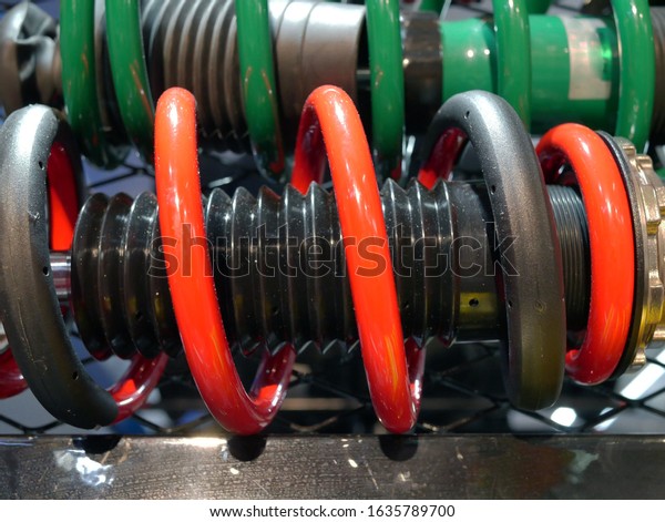 shock absorbers of car at\
garage.