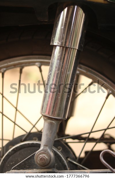 Shock absorbers are mechanical\
devices designed to reduce the shock caused by kinetic\
energy