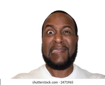 Shock And Cringe Funny Face Shot Of A African American Male Showcasing Facial Expression