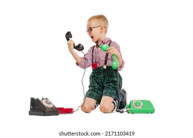 Shock, Serprise. One Little Cute Kid In Retro Style Outfit, Fashion Of 70s, 80s Years Using Retro Phone Isolated On White Studio Background With Copyspace For Ad. Concept Of Emotions