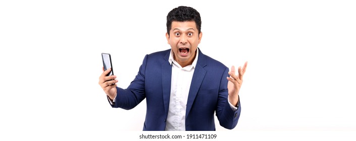 Shock And Surprise Face Of Business Asian Man Presenting Smart Phone On White Background In Studio.