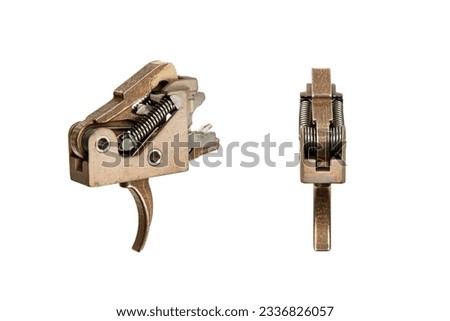 Shock trigger for gun isolate on white background. Gun trigger. Repair spare part.