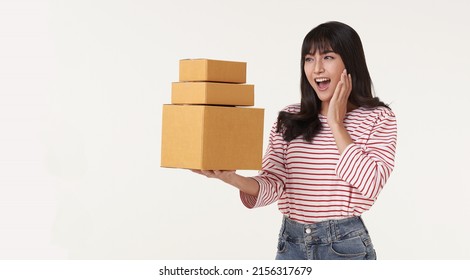 Shocked Asian Woman Holding Package Parcel Box. Special Delivery Courier And Shipping Service Concept.