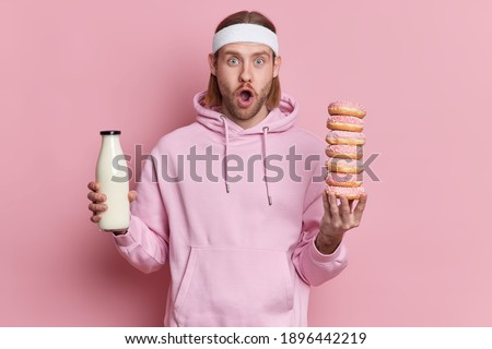 Similar – Image, Stock Photo man and donut Food Dessert