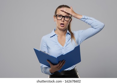 Shocked Businesswoman Make A Mistake In Office Documents 