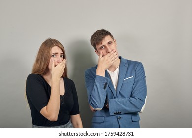 Shocked Covering Mouth With Hands Scared, Feel Horrified Stunned Looking, Startled Mute Keep Silent Secret Portrait, Surprised Face Afraid In Silence, Speechless. Young Attractive Couple