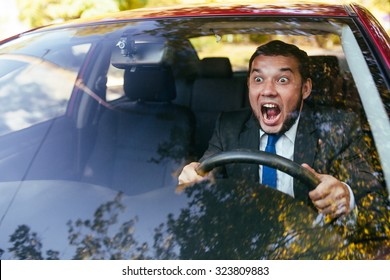 shocked driver in the car