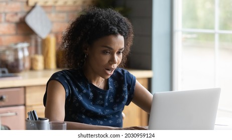 Shocked Frustrated Millennial African Girl Surprised With Laptop Problems, Getting Email Letter With Bad News, Becoming Scam Victim, Looking At Screen With Online App Mistake, Software Error. Banner