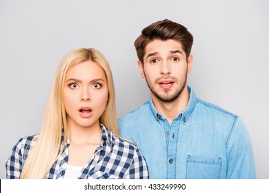 Shocked Funny Young Couple  Opening Mouth