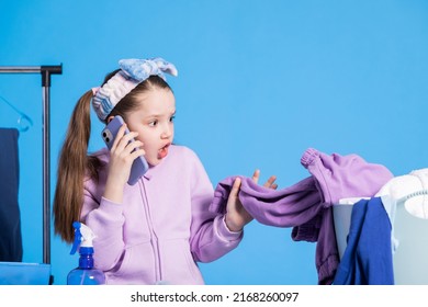 Shocked Girl Irons Sorting Clothes, Notices Mistake, Stained Sweatshirt, Calls Mom Horrified, Children's Performance Of Household Chores.