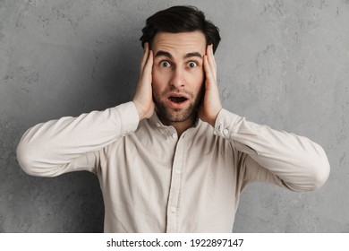 Shocked Handsome Guy Expressing Surprise Grabbing Stock Photo ...