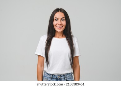 Shocked Impressed Extremely Happy Surprised Caucasian Young Girl Woman Shouting Wearing White T-shirt Isolated In Grey Background. Sale Discount Offer Concept