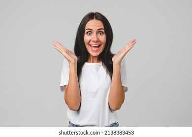 Shocked Impressed Extremely Happy Surprised Caucasian Young Girl Woman Shouting Isolated In Grey Background. Sale Discount Offer Concept