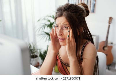 Shocked Panicked Woman Sitting At Desk And Having Computer Problems