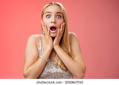 Shocked Speechless Concerned Young Stunned Woman Gasping Screaming Worried Drop Jaw Touch Cheeks Widen Eyes Surprised Nervously Staring Camera Troubled Afraid, Standing Red Background