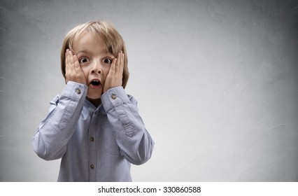 Shocked and surprised boy with copy space concept for amazement, astonishment, making a mistake, stunned and speechless or back to school