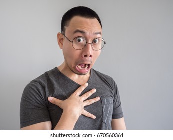 Shocked And Surprised Freelance Asian Man With Funny Face.