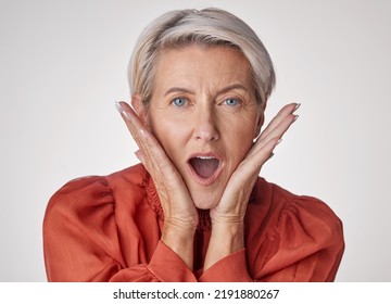 Shocked, Surprised And Old Face Of A Beautiful Senior Woman With A Wow Facial Expression. Portrait Of An Old And Elderly Female In Shock About A Retail Sale Deal, Secret Or Good News Or Announcement