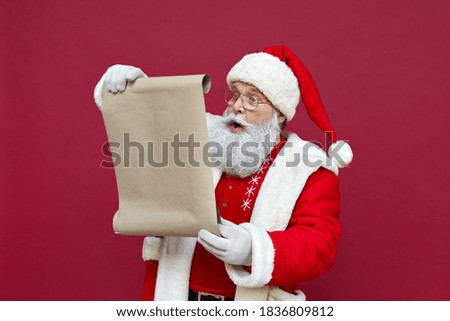 Similar – Image, Stock Photo Child Wearing Christmas Santa Claus Hat and beard on yellow background