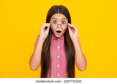 Shocked Surprised Teenager Girl. Portrait Of Teenager Child Girl In Glasses. Kid At Eye Sight Test. Girl With Eyeglasses And Looking At Camera. Vision For Children.