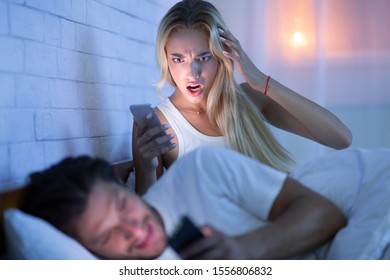 Shocked Wife Catching Cheating Husband Chatting Stock Photo 155 pic