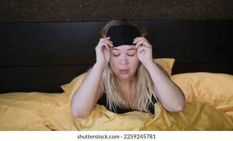 Shocked young woman wakes up with anxiety. Woman overslept - Shutterstock ID 2259245781