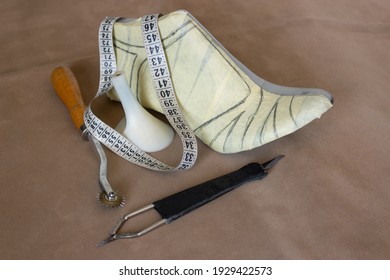 Shoe Design Equipment. Die Taped, Tape Measure, Heel, Cut Blade, Wheel Gear Roulette