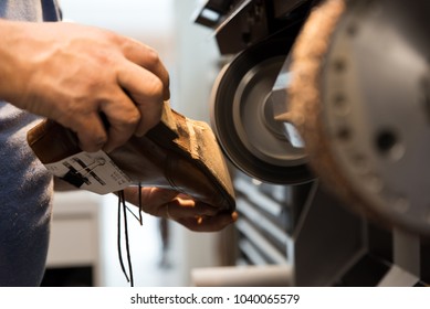 Shoe Maker Repairing Shoes.