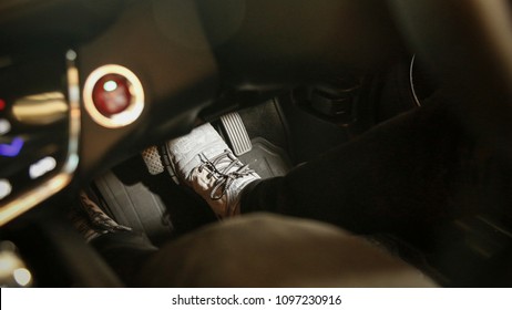 Shoe On Pedal Brake Of A Car