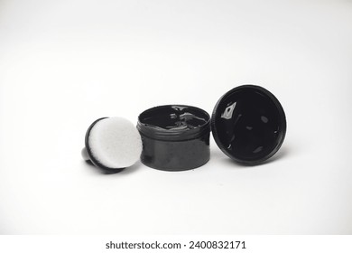 Shoe polish jar with sponge on white background - Powered by Shutterstock