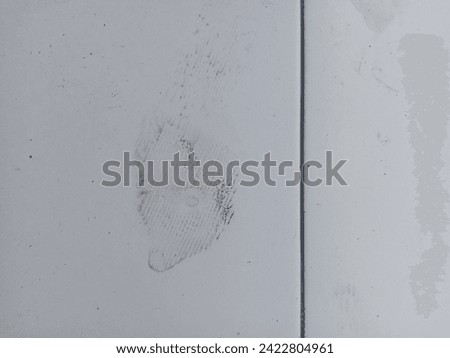 Shoe prints on a white floor. perfect for background and texture themes