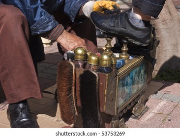 Shoe Shiner At Work