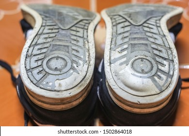 Shoe Soles Deterioration And Damage From Use Closeup.