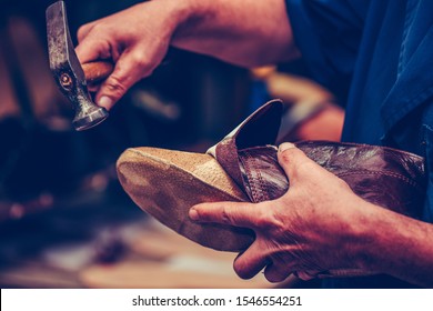 Shoemaker workshop for making shows artisan handmade manufacturing leather shoes. Shoe manufacture business for traditional vintage shoe making, craft shoes in traditional style - Powered by Shutterstock