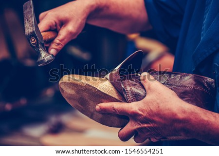 Shoemaker workshop for making shows artisan handmade manufacturing leather shoes. Shoe manufacture business for traditional vintage shoe making, craft shoes in traditional style